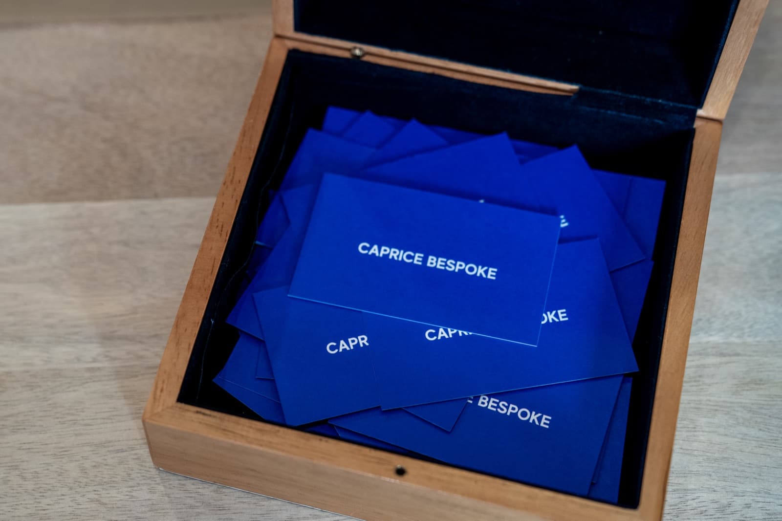 Caprice Bespoke cards in a velvet-lined box: a refined gift moment.